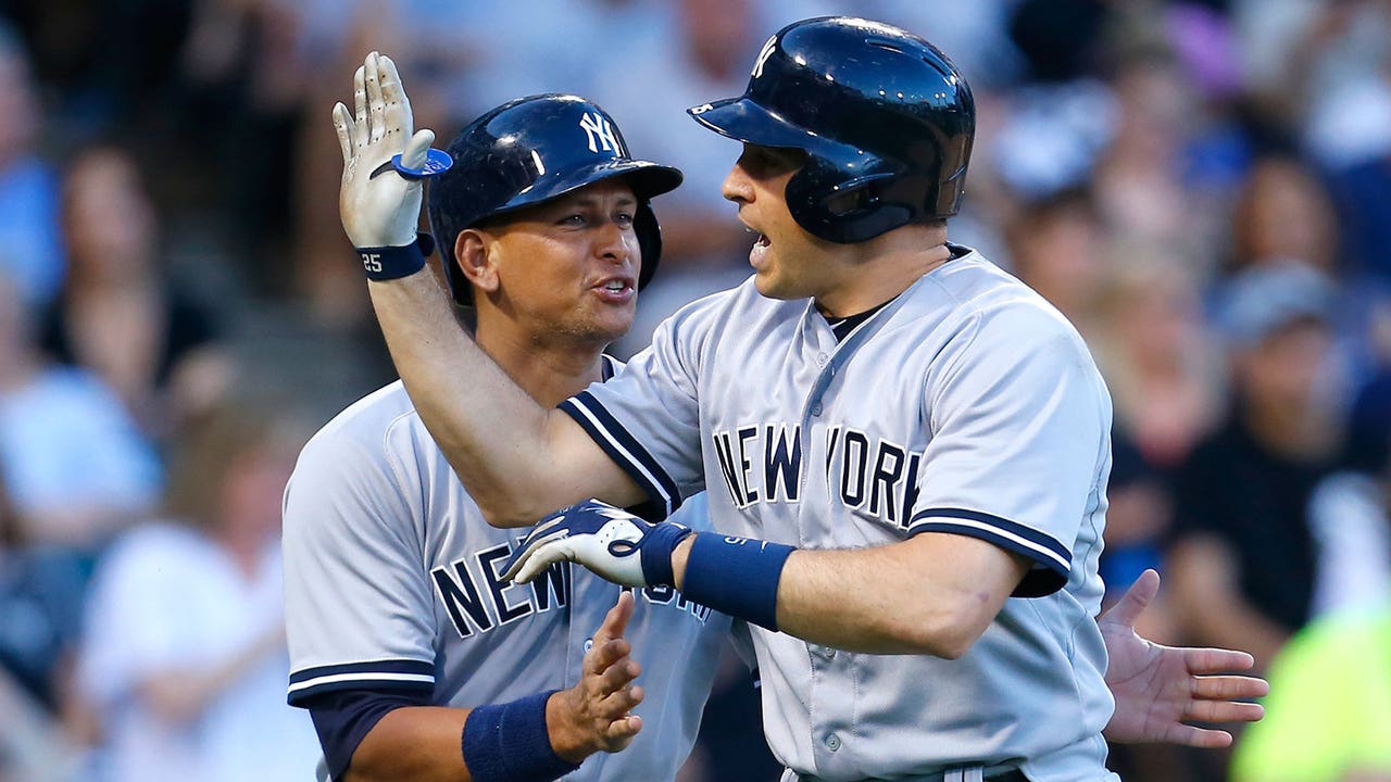 Two more HRs for Yanks' Teixeira, from both sides for record 14th time